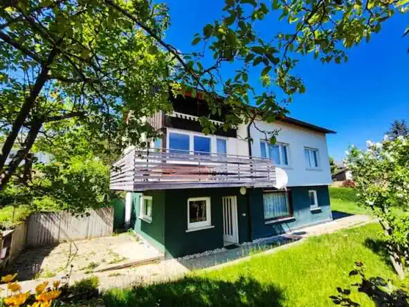 Wohnung Rottenbug kaufen, 5-Zimmer-Wohnung mit Gartenanteil und Garagenstellplatz.
